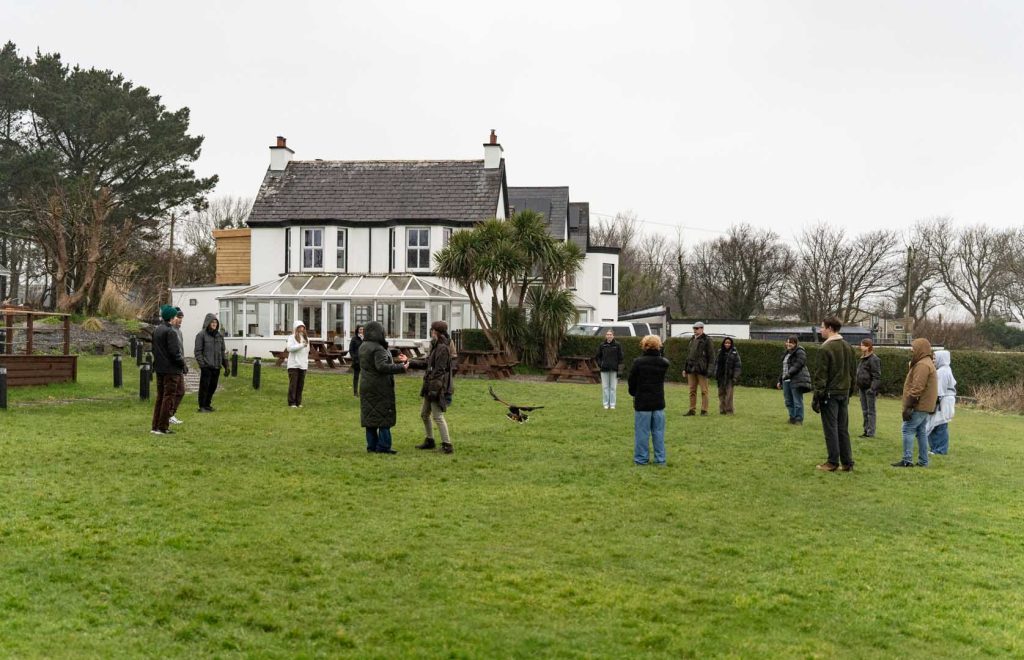 A group of onlookers enjoying a demonstration